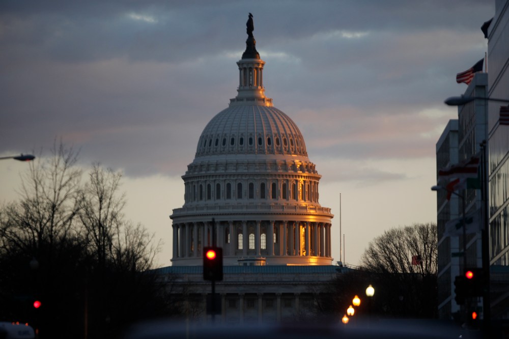 The dome of the U.S. Capitol Building is seen as the sun sets on Capitol Hill in Washington, Thursday, March 7, 2013. (AP Photo/Charles Dharapak)