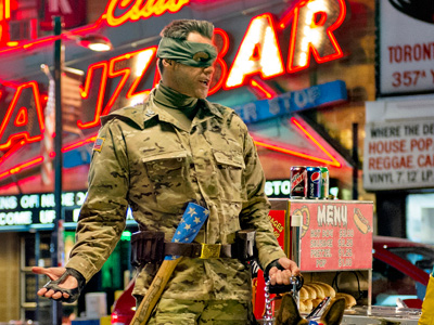 Jim Carrey playing the role of "Col. Stars and Stripes" in "Kick-Ass 2." (Photo by Daniel Smith/Universal Pictures/AP)