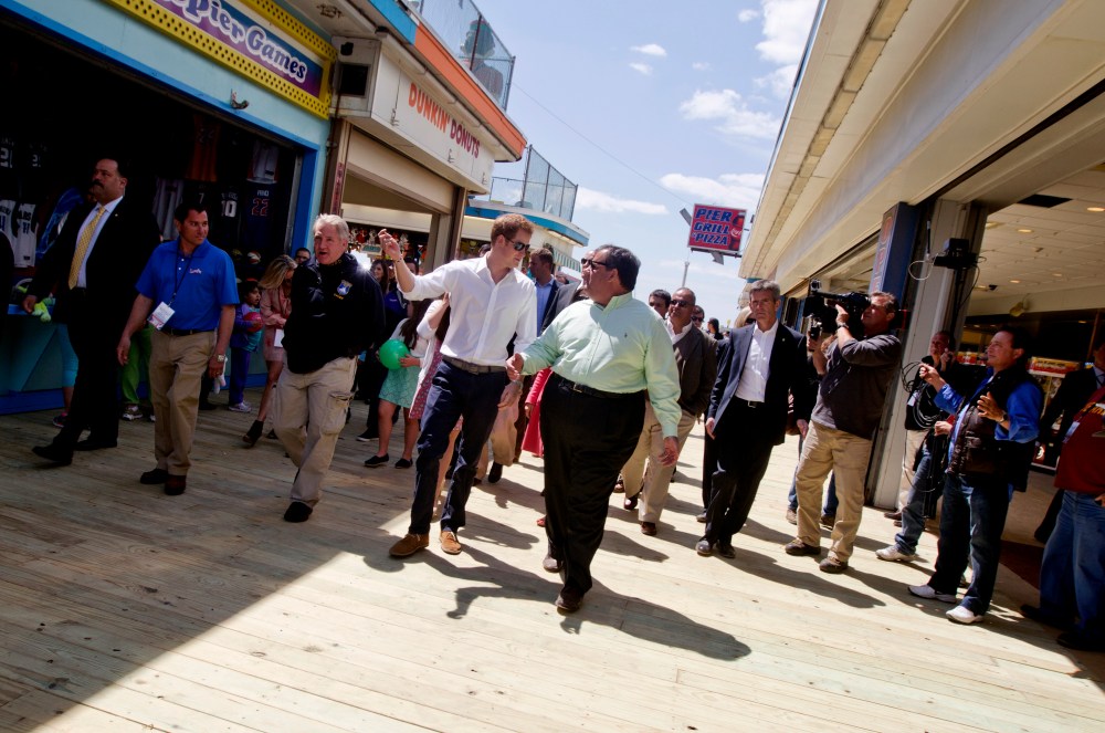 Britians Prince Harry and N.J. Gov. Chris Christie walk the new boardwalk in Seaside Heights during a tour of areas of Ocean County that suffered extensive damage during Hurricane Sandy on Tuesday, May 14, 2013.  Prince Harry began a tour  of New...