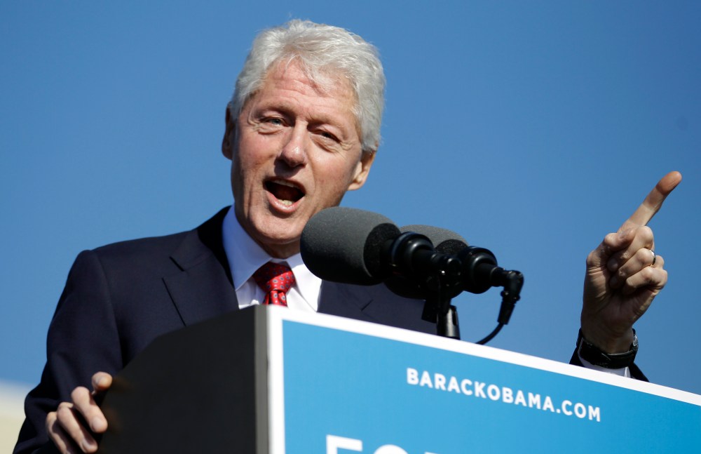 Former President Bill Clinton gestures while speaking at a campaign rally for President Barack Obama at the University of Central Florida, Monday, Oct. 29, 2012, in Orlando, Fla.  (AP Photo/John Raoux)