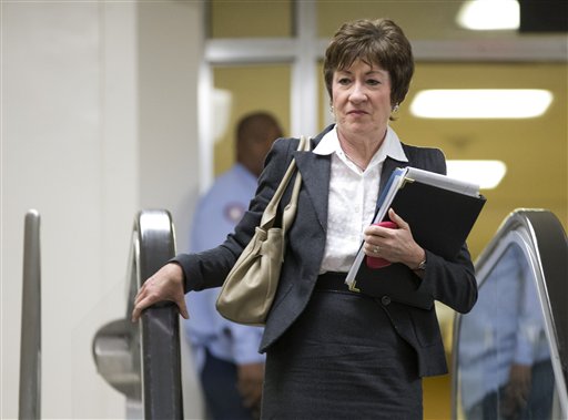 Sen. Susan Collins, R-Maine, ranking Republican on the Senate Homeland Security and Governmental Affairs Committee walks to a meeting on Capitol Hill in Washington, Wednesday, Nov. 28, 2012, for a meeting with UN Ambassador Susan Rice.  (AP Photo/ Evan...