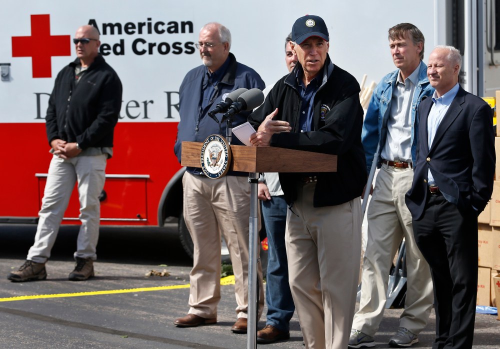 Rep. Mike Coffman, R-Colo., following a day in which Vice President Biden and others surveyed area flood damage by helicopter, in Greeley, Colo., Monday Sept. 23, 2013.