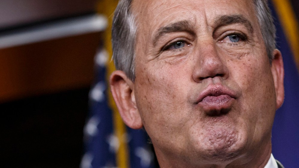 House Speaker John Boehner of Ohio responds to reporters about the impasse over passing the Homeland Security budget because of Republican efforts to block President Barack Obama's executive actions on immigration, on Feb. 26, 2015.