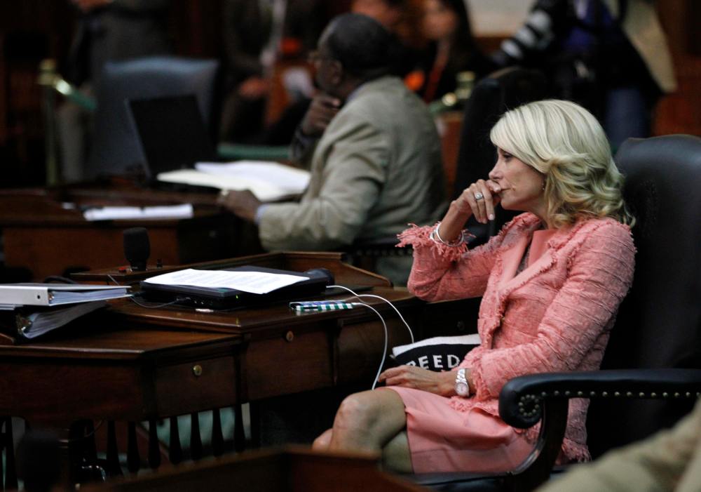 Texas state Democratic Senator Wendy Davis listens as the state Senate meets to consider legislation restricting abortion rights in Austin, Texas, July 12, 2013. (REUTERS/Mike Stone)