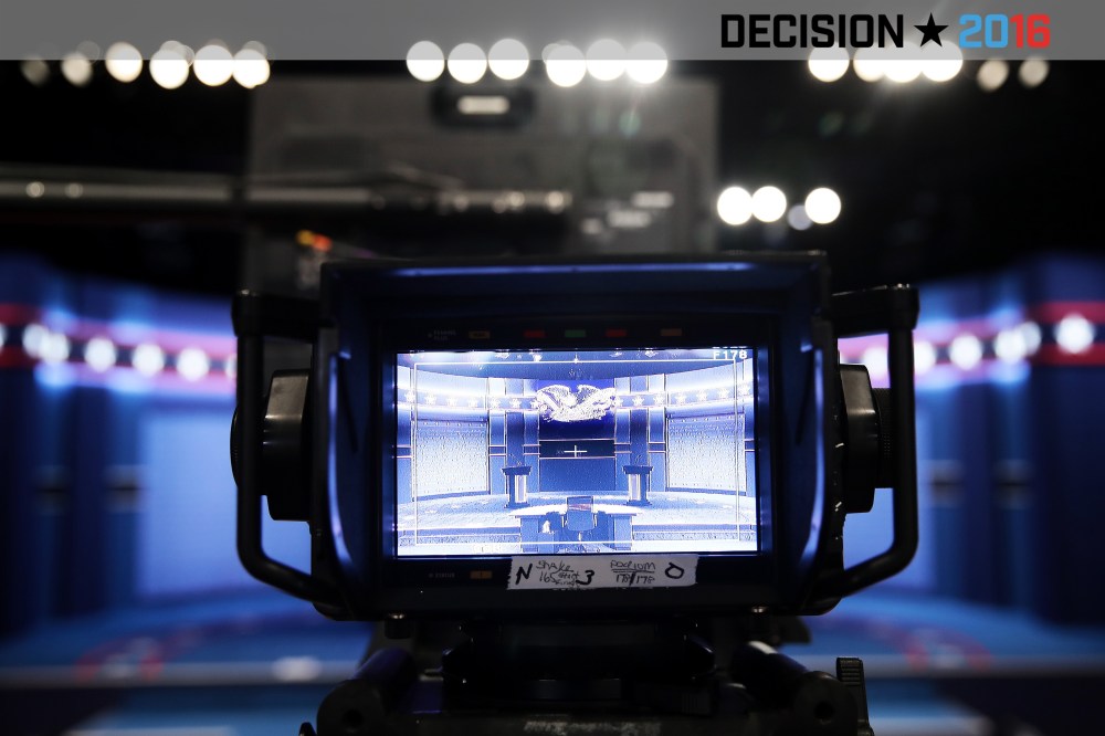 The stage is displayed on a television monitor prior to the start of the third U.S. presidential debate at the Thomas & Mack Center on Oct. 19, 2016 in Las Vegas, Nev. (Photo by Drew Angerer/Getty)