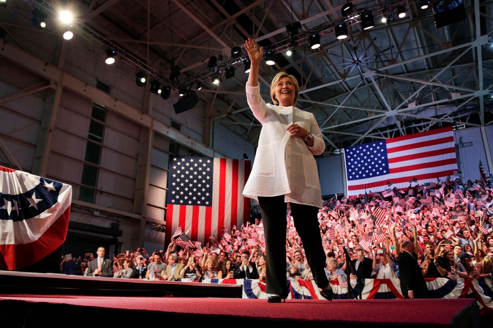 Democratic presidential candidate Hillary Clinton waves to supporters during a presidential primary election night rally, June 7, 2016, in New York. (Photo by Julie Jacobson/AP)