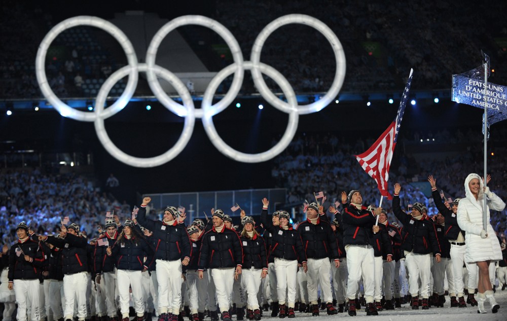 Athletes and members of the US delegation, including flagbearer and luger Mark Grimmette attend the opening ceremony for the Vancouver Winter Olympics at BC place in Vancouver on February 12, 2010.