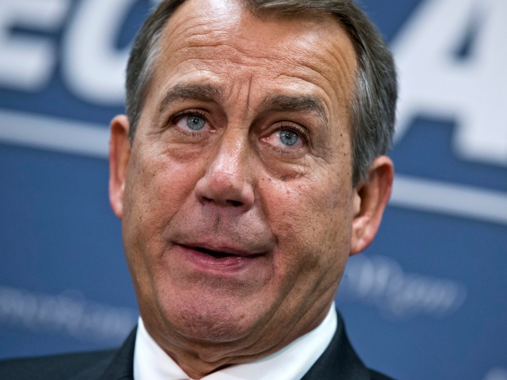 House Speaker John Boehner, who conferred with President Barack Obama by phone yesterday, speaks to reporters on Capitol Hill in Washington, Wednesday, following a closed-door meeting with the GOP caucus. (AP Photo/J. Scott Applewhite)