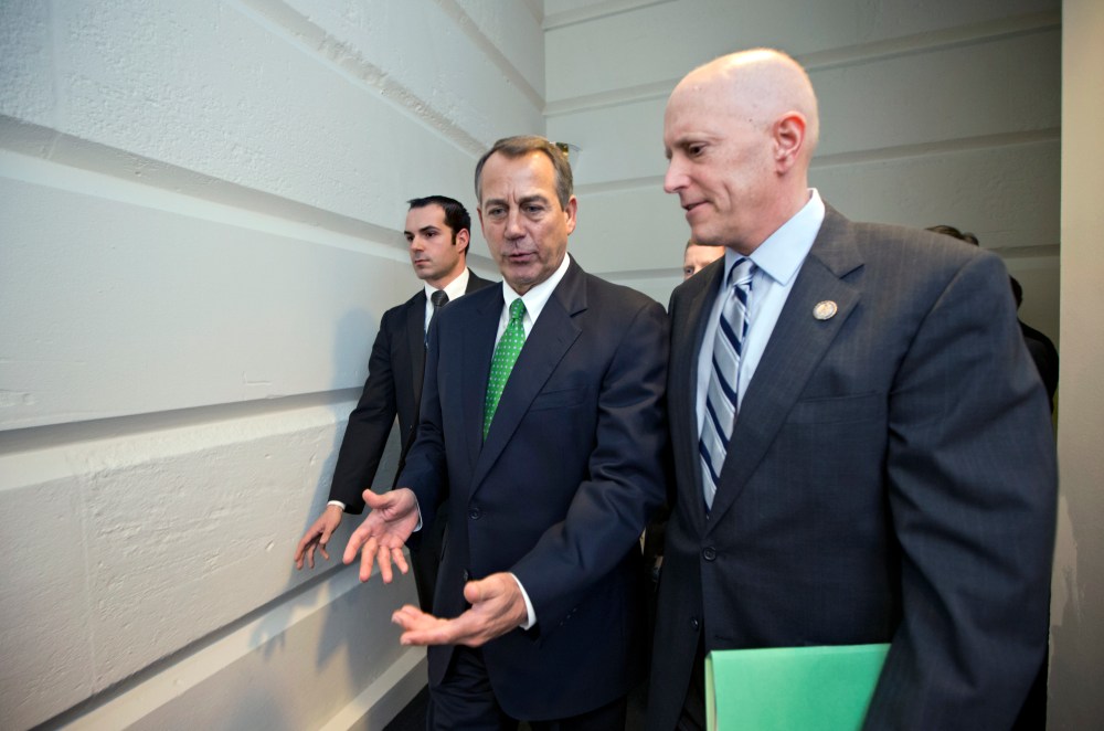Speaker of the House John Boehner and House Ways and Means Committee Chairman Dave Camp at the Capitol in Washington, D.C., January 1, 2013.
