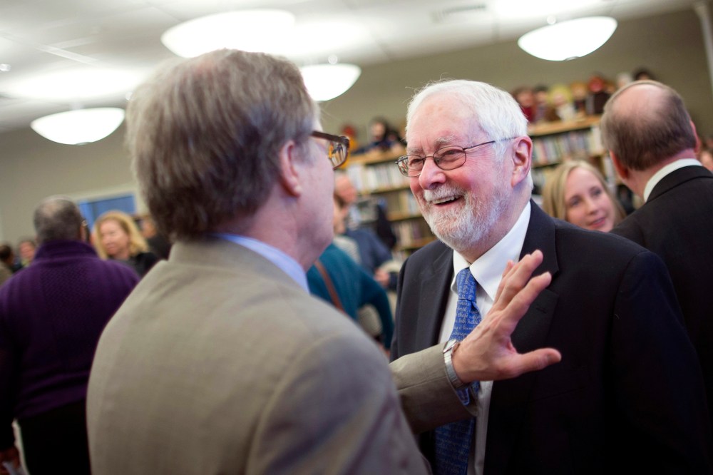 The Rev. Thomas Ogletree smiles following an announcement that a case against him for officiating his son's same-sex marriage had been dropped, on March 10, 2014, in White Plains, N.Y.