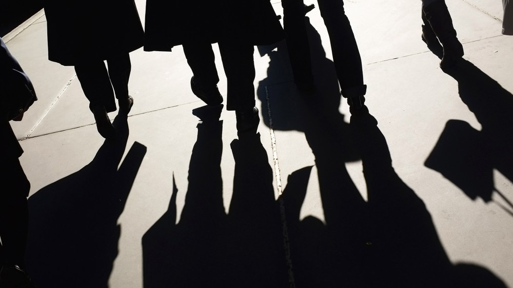 People walk along Madison Avenue on Nov. 1, 2011 in New York City. (Photo by Spencer Platt/Getty)