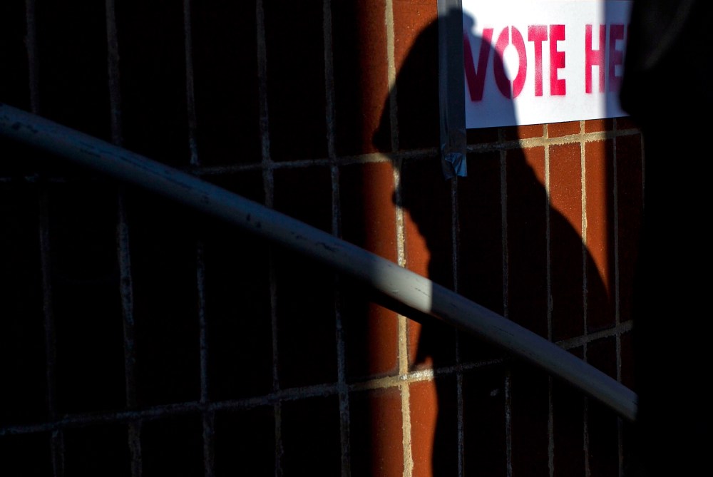 A voter enters a polling station to cast their ballot in the "Super Tuesday" Republican presidential primary at the Russell Apartments March 6, 2012 in Cambridge, Mass. (Photo by Win McNamee/Getty)