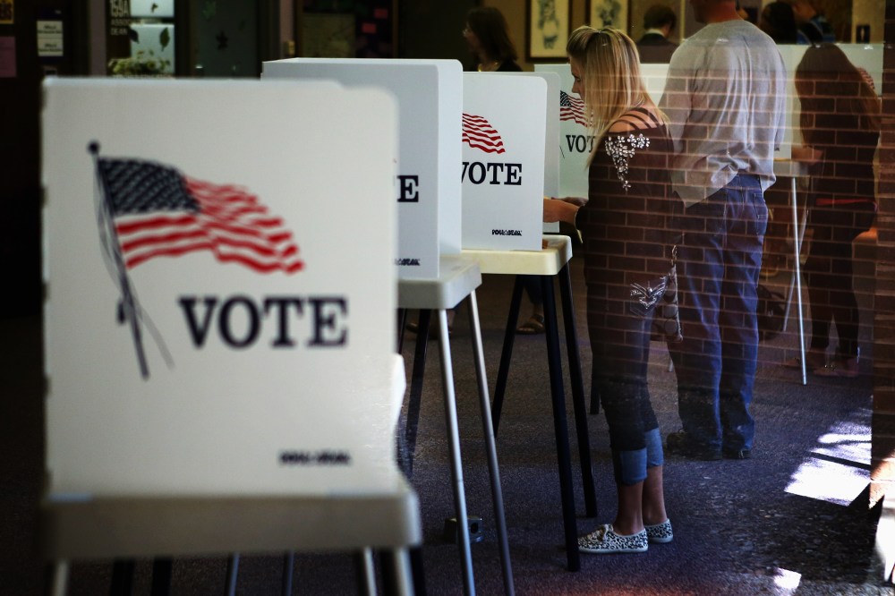 Residents vote at a polling place on the campus of the University of Northern Iowa (UNI) on Sept. 28, 2012 in Cedar Falls, Iowa. (Photo by Scott Olson/Getty)