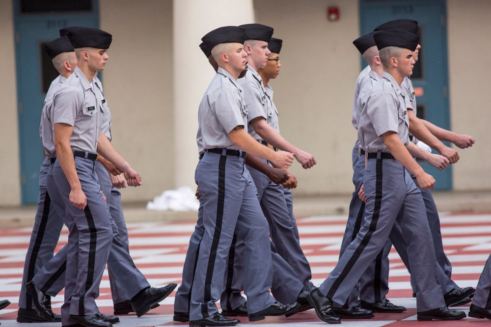 Citadel freshman cadets known as knobs drill for the first time in their new uniforms on Aug. 19, 2013 in Charleston, S.C. (Photo by Richard Ellis/Getty)