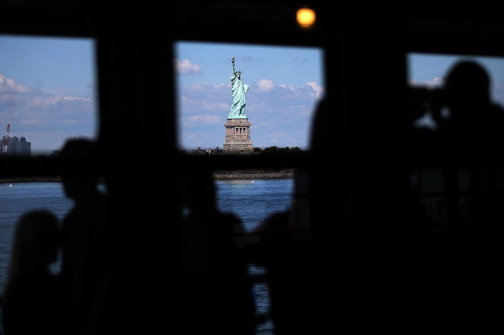 People view the Statue of Liberty in New York, N.Y. (Photo by Spencer Platt/Getty)