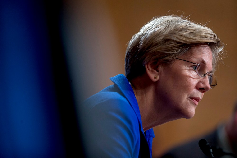 Senator Elizabeth Warren (D-Mass.) listens during a hearing in Washington, D.C., on Nov. 21, 2014. (Photo by Andrew Harrer/Bloomberg/Getty)