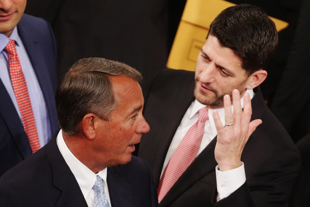Speaker of the House John Boehner talks with Rep. Paul Ryan in the House of Representatives chamber at the U.S. Capitol Jan. 6, 2015 in Washington, DC. (Photo by Chip Somodevilla/Getty)