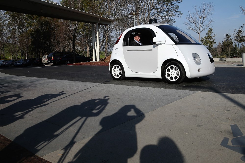 Google Chairman Eric Schmidt sits in a Google self-driving car at the Google headquarters on Feb. 2, 2015 in Mountain View, Calif. (Photo by Justin Sullivan/Getty)