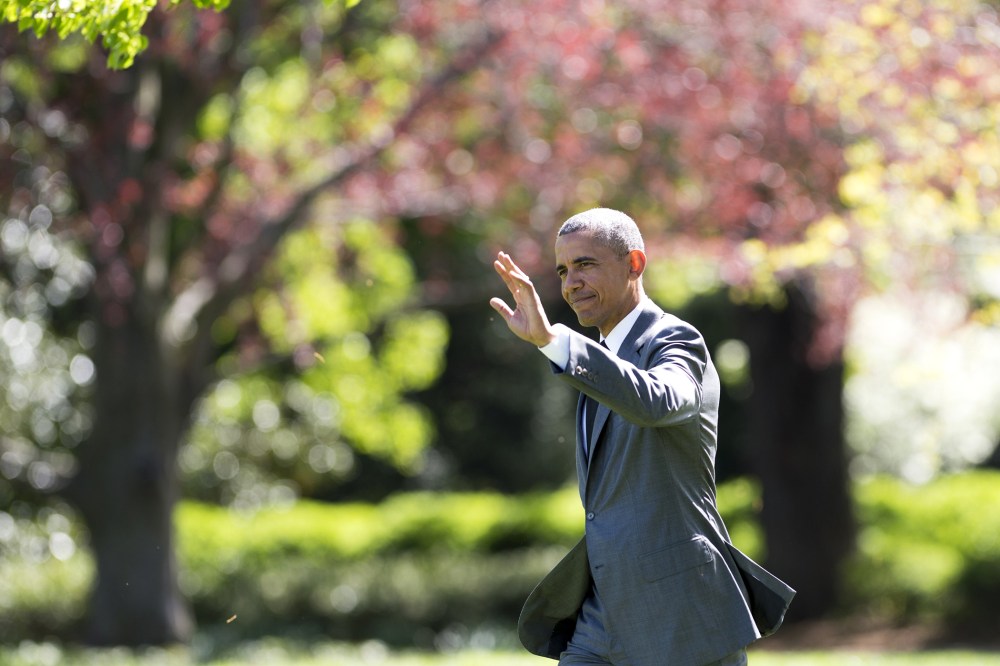 President Barack Obama walks to Marine One before departing from the South Lawn of the White House in Washington, D.C., April 29, 2015. (Photo by Soul Loeb/AFP/Getty)