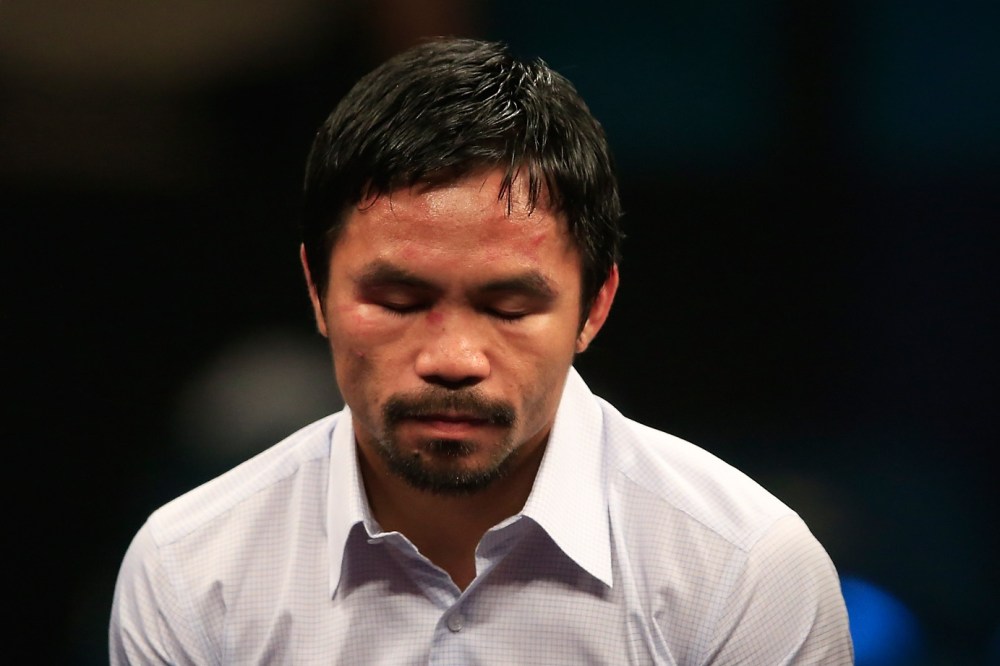 Manny Pacquiao answers questions during the post-fight news conference on May 2, 2015 at MGM Grand Garden Arena in Las Vegas, Nev. (Photo by Jamie Squire/Getty)