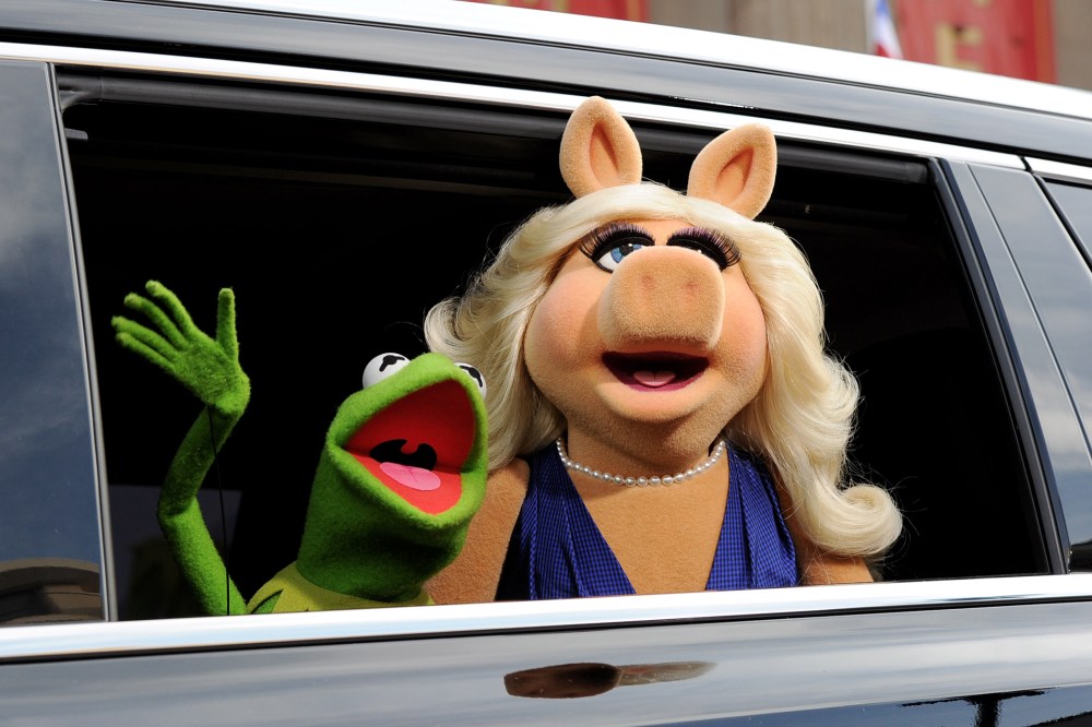 Kermit the Frog (L) and Miss Piggy arrive at the premiere of Disney's "Muppets Most Wanted" at the El Capitan Theatre on March 11, 2014 in Los Angeles, California. (Photo by Kevin Winter/Getty)