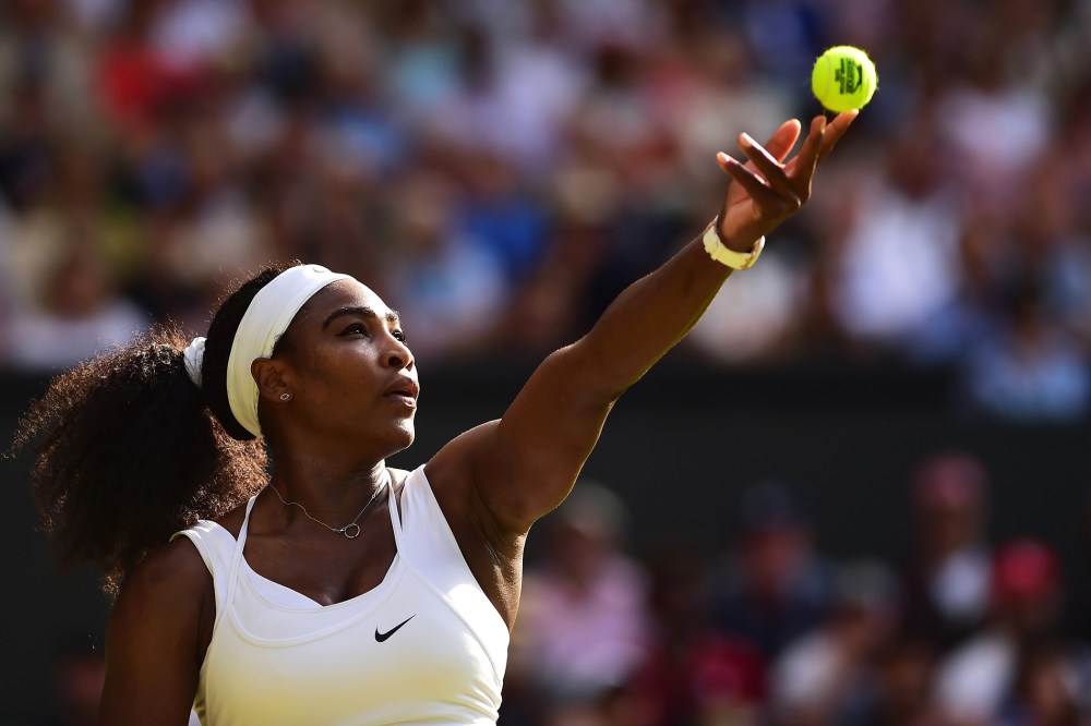 Serena Williams serves in her Ladies Singles Third Round match during day five of the Wimbledon Lawn Tennis Championships at the All England Lawn Tennis and Croquet Club on July 3, 2015 in London, England. (Photo by Shaun Botterill/Getty)
