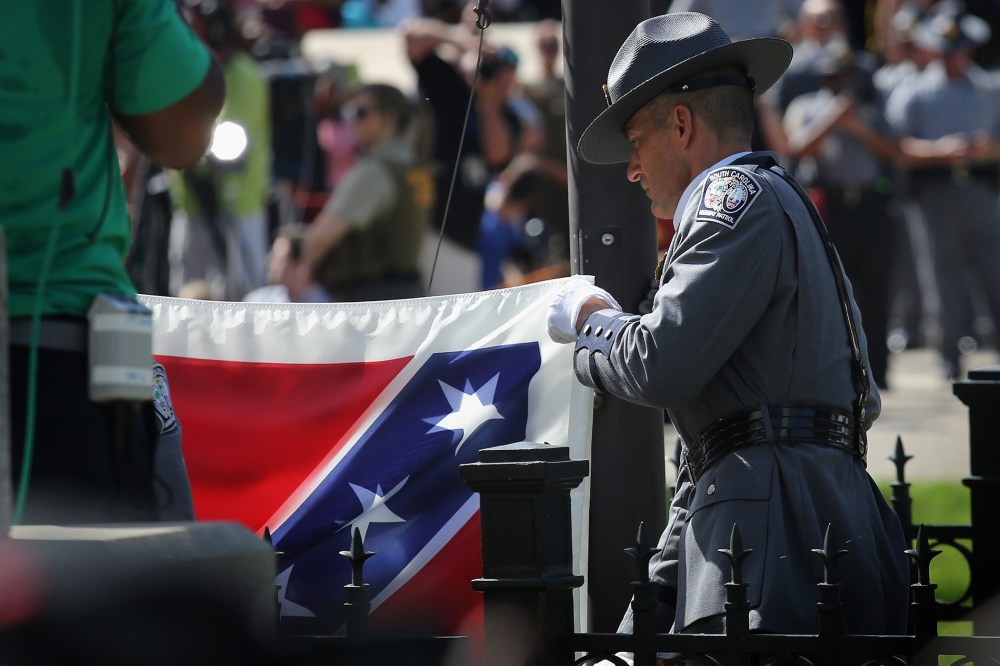Confederate Flag removed from South Carolina Statehouse grounds on July 10, 2015 in Columbia, South Carolina (Photo by John Moore/Getty).