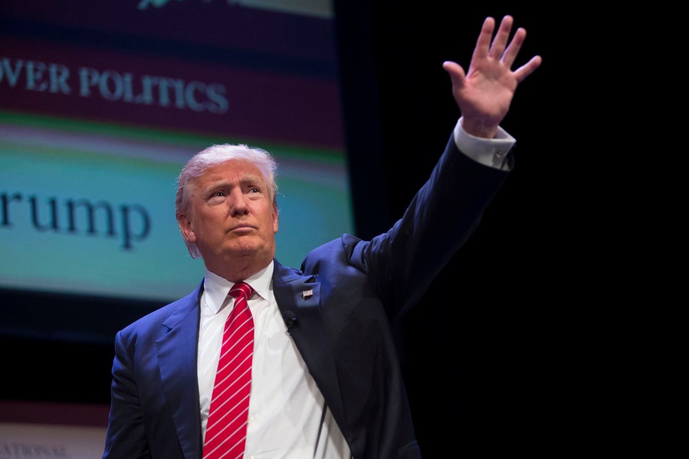 Donald Trump waves after speaking at The Family Leadership Summit in Ames, Iowa (Photo by Daniel Acker/Bloomberg via Getty).