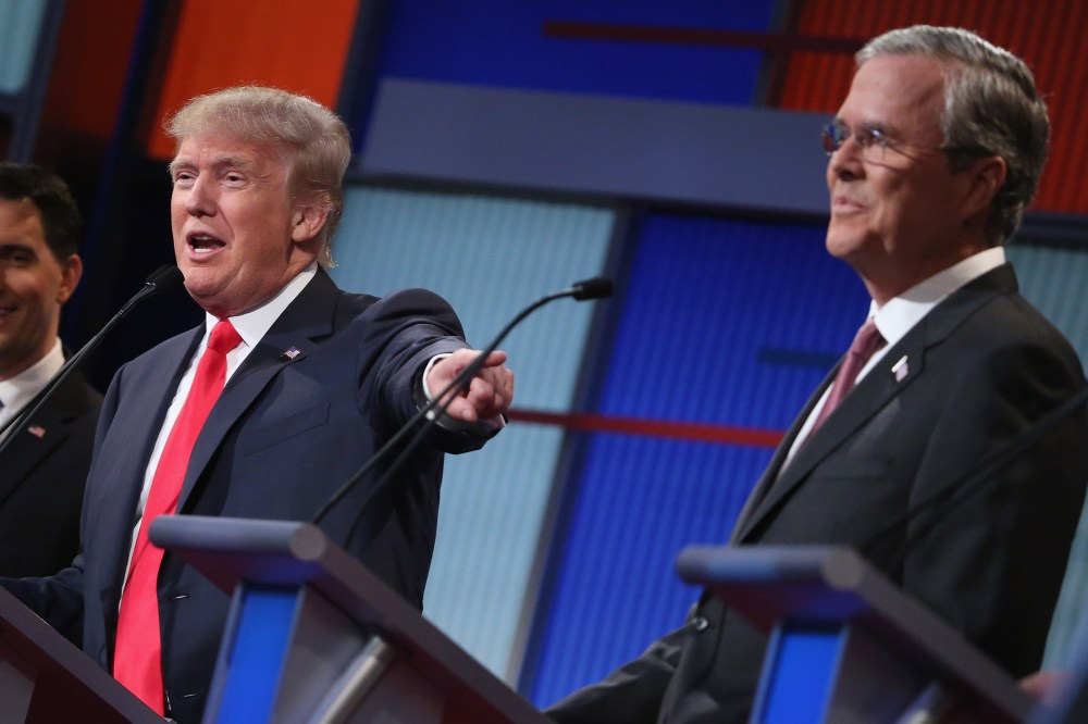 Republican presidential candidates Donald Trump and Jeb Bush participate in the first prime-time presidential debate on Aug. 6, 2015 in Cleveland, Ohio. (Photo by Chip Somodevilla/Getty)