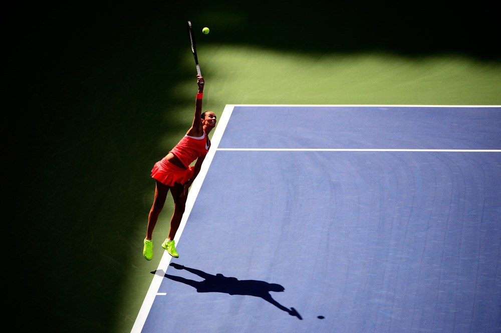 Roberta Vinci of Italy serves to Serena Williams of the United States during their Women's Singles Semifinals match on Day Twelve of the 2015 US Open on September 11, 2015. (Photo by Alex Goodlett/Getty)