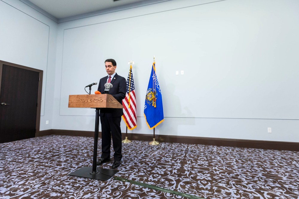 Wisconsin Gov. Scott Walker announces that he will end his bid for the White House at a news conference Sept. 21, 2015 in Madison, Wisconsin. (Photo by Andy Manis/Getty)