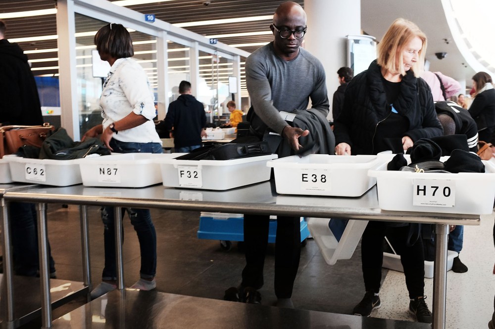 People go through security at JFK Airport, Nov. 25, 2015 in Queens, New York City. (Photo by Spencer Platt/Getty)