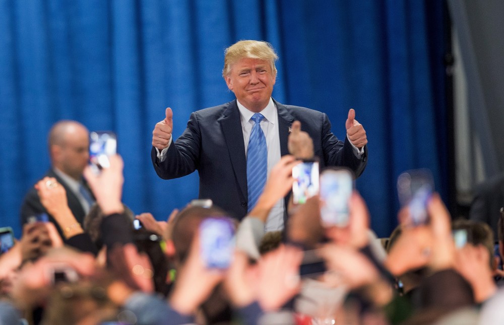 Republican presidential candidate Donald Trump arrives for a campaign event at Mississippi Valley Fairgrounds on Dec. 5, 2015 in Davenport, Ia. (Photo by Scott Olson/Getty)