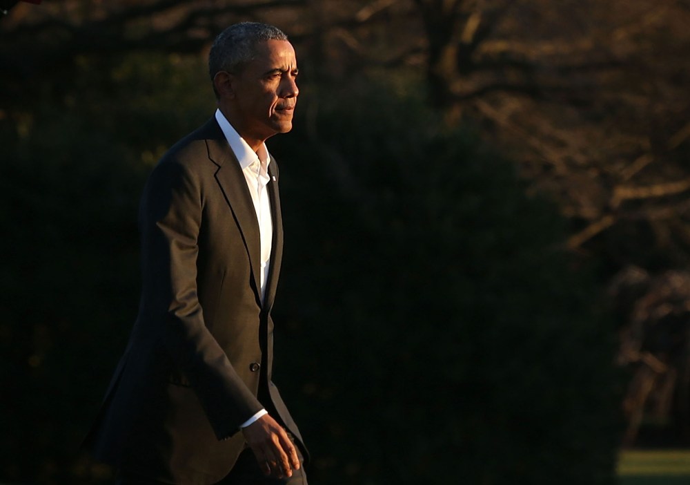 U.S. President Barack Obama walks on the South Lawn after he returned to the White House, Jan. 14, 2016 in Washington, DC. (Photo by Alex Wong/Getty)