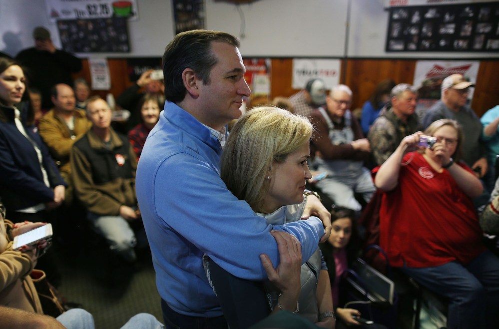 Republican presidential candidate Sen. Ted Cruz (R-TX) hugs his wife, Heidi Cruz, before he is introduced during a campaign event at 3 Generations Bar & Grill on Jan. 29, 2016 in Ringsted, Ia. (Photo by Joe Raedle/Getty)