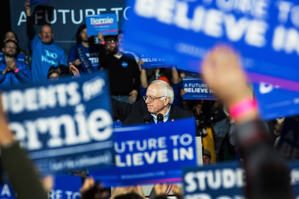 Democratic presidential hopeful Sen. Bernie Sanders waves after speaking at a campaign rally on Feb. 8, 2016 in Durham, N.H. (Photo by Andrew Burton/Getty)