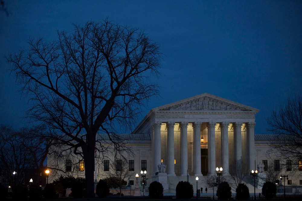The U.S. Supreme Court is seen in at dusk on February 14, 2016 in Washington, DC. (Photo by Drew Angerer/Getty)