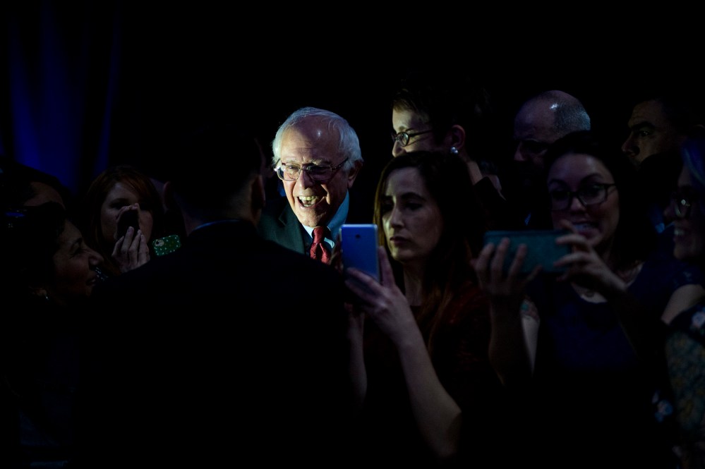 Presidential candidate Bernie Sanders poses for selfies with supporters after speaking during the Clark County Democratic Party Kick Off to Caucus Dinner at the Tropicana in Las Vegas, Nev., Feb. 18, 2016. (Photo By Bill Clark/CQ Roll Call/Getty)