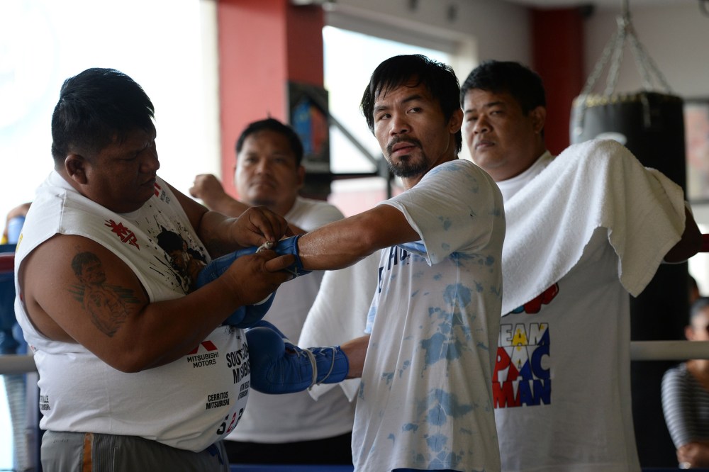 )Philippine boxing legend Manny Pacquiao prepares for a training session with his staff at a gym in General Santos City in the southern Philippine island of Mindanao., Feb. 15, 2016. (Photo by Ted Aljibe/AFP/Getty)