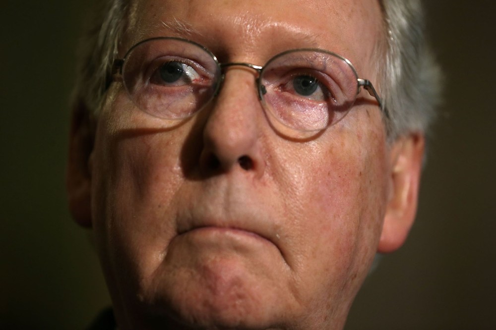 U.S. Senate Majority Leader Sen. Mitch McConnell listens during a news briefing after the weekly Republican policy luncheon, March 8, 2016 on Capitol Hill in Washington, DC. (Photo by Alex Wong/Getty)