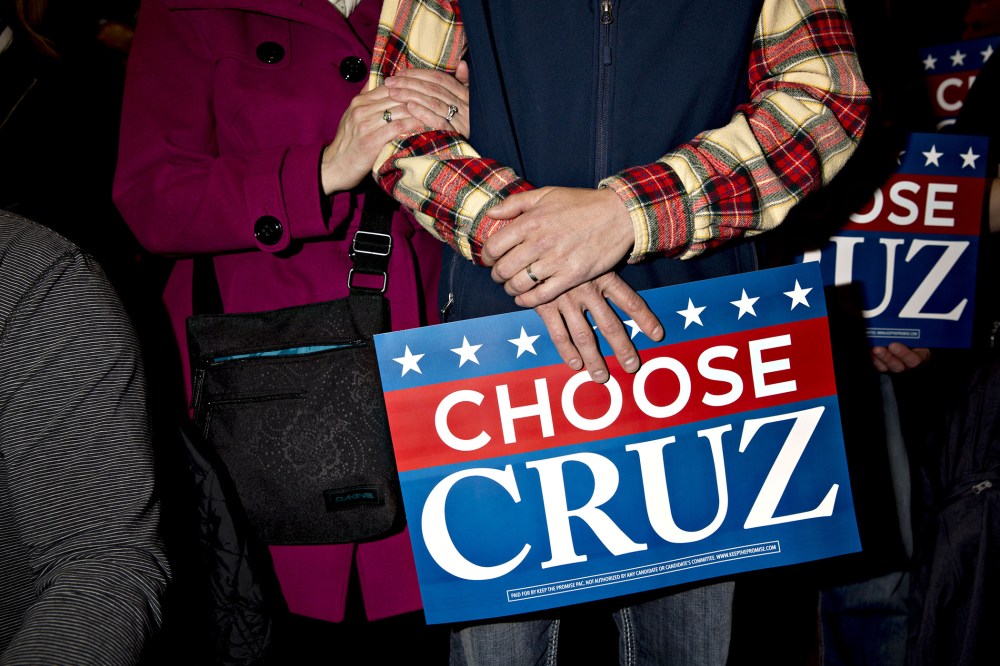 Attendees wait for the start of a campaign rally with Senator Ted Cruz, a Republican from Texas and 2016 presidential candidate, in Green Bay, Wis., April 3, 2016. (Photo by Daniel Acker/Bloomberg/Getty)