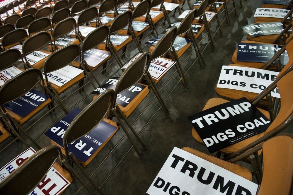 Campaign signs are seen before a rally for Republican Presidential hopeful Donald Trump in Charleston, W. Va., on May 5, 2016. (Photo by Brendan Smialowski/AFP/Getty)