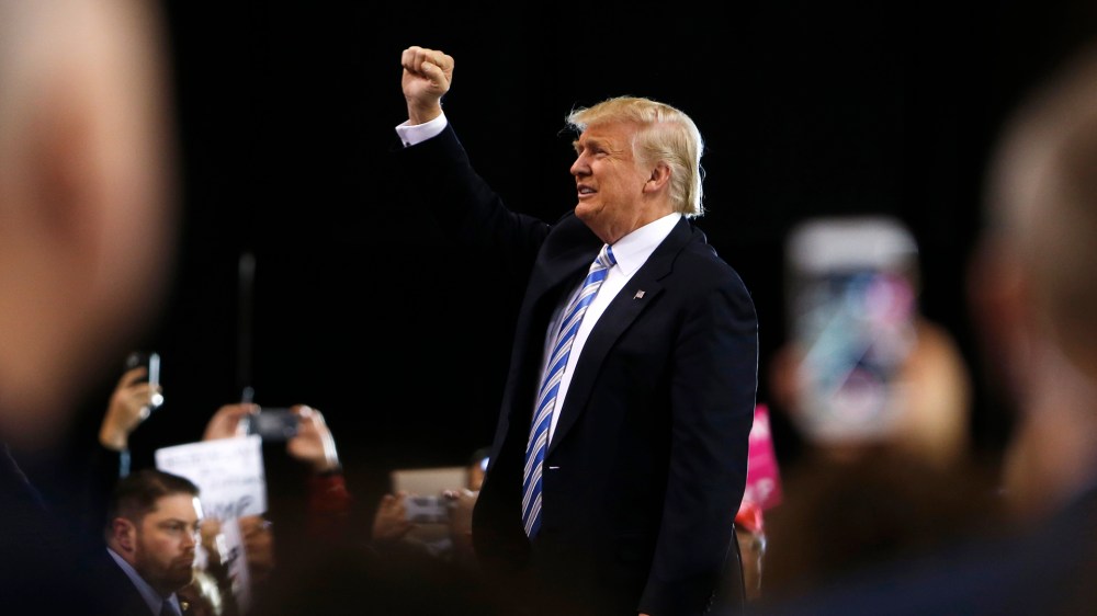 Republican presidential candidate Donald Trump greets supporters at a campaign rally in Cleveland, Ohio on Oct. 22, 2016. (Photo by Jay Laprete/AFP/Getty)