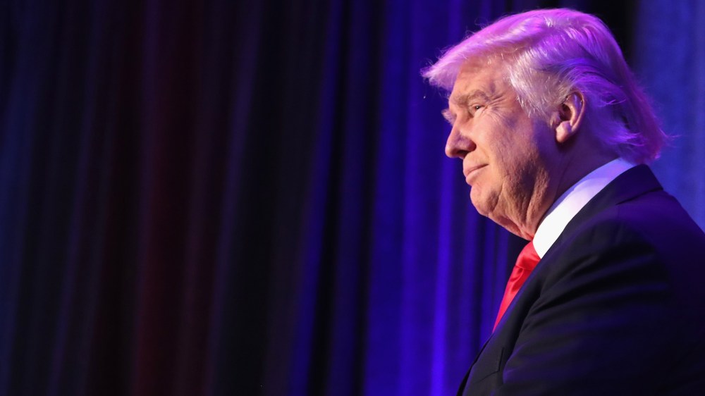 Republican president-elect Donald Trump acknowledges the crowd during his election night event in the early morning hours of Nov. 9, 2016 in New York, N.Y. (Photo by Joe Raedle/Getty)