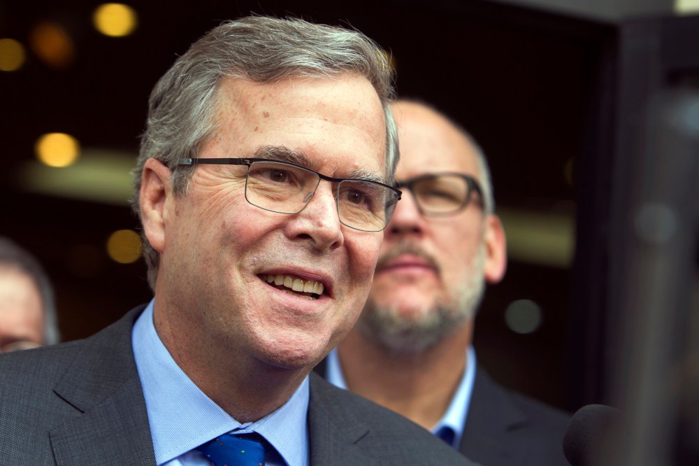 Former Florida Gov. Jeb Bush speaks with reporters after a discussion and question and answer session at the Mountain Shadows Community Center in Las Vegas on March 2, 2015.