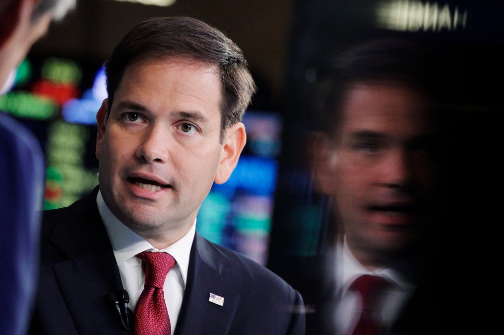 Republican presidential candidate, Sen. Marco Rubio, R-Fla., talks to CNBC correspondent John Harwood, left, during an interview at the New York Stock Exchange, Oct. 5, 2015. (Photo by Mark Lennihan/AP)