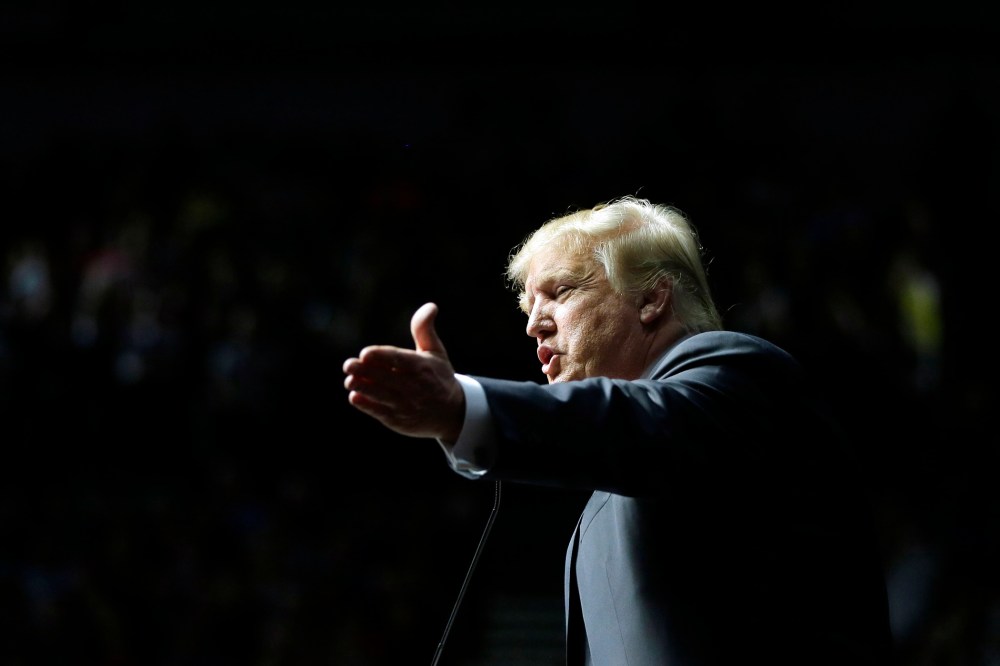 Republican presidential candidate, businessman Donald Trump addresses supporters at a campaign rally, Dec. 21, 2015, in Grand Rapids, Mich. (Photo by Carlos Osorio/AP)