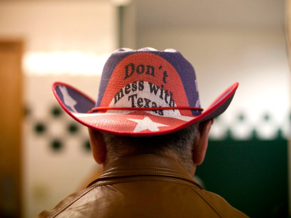 File Photo: Conservative supporters gather at the Victory Texas and Republican Party of Texas election night watch party for Republican Gov. Rick Perry, at the Texas Disposal Systems Exotic Game Ranch on November 2, 2010 in Buda, Texas. Gov. (Photo by...