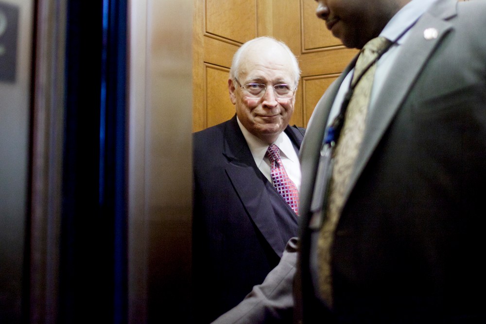 Former Vice President Dick Cheney boards an elevator at the U.S. Capitol.