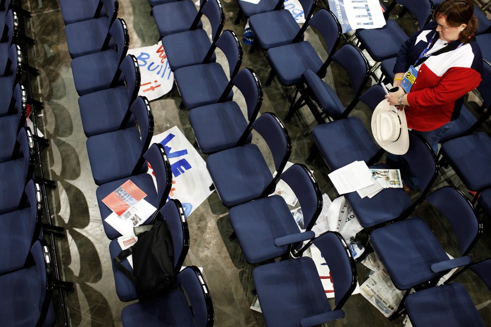 A delegate from Texas prays during the Republican National Convention.